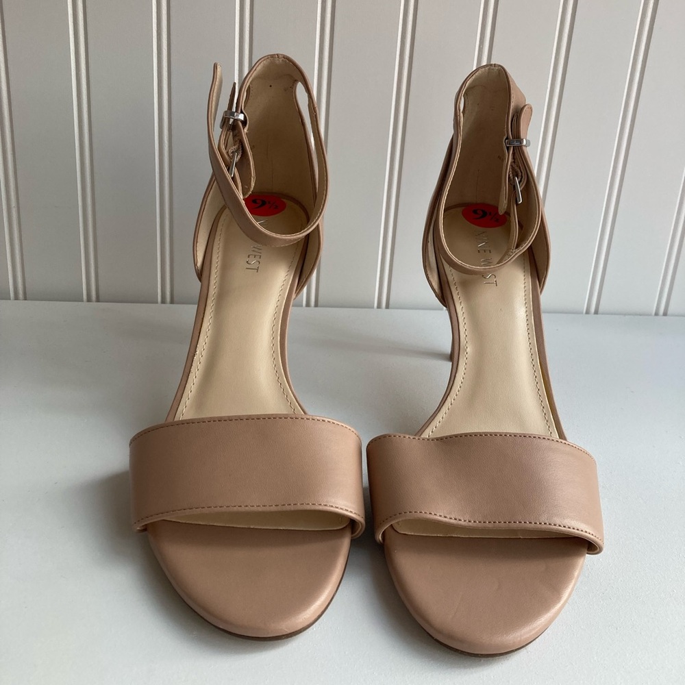 Nine West Nizzy Ankle Strap Sandal Nude  New with interior flaw*
Size 9.5